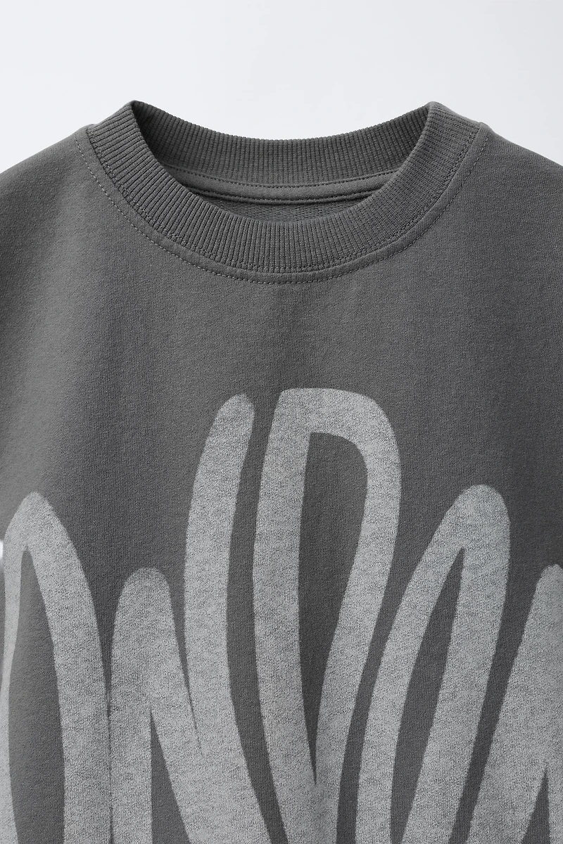 T-SHIRT À IMPRIMÉ GRAFFITI