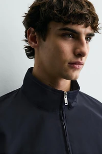 BLOUSON TECHNIQUE DÉPERLANT