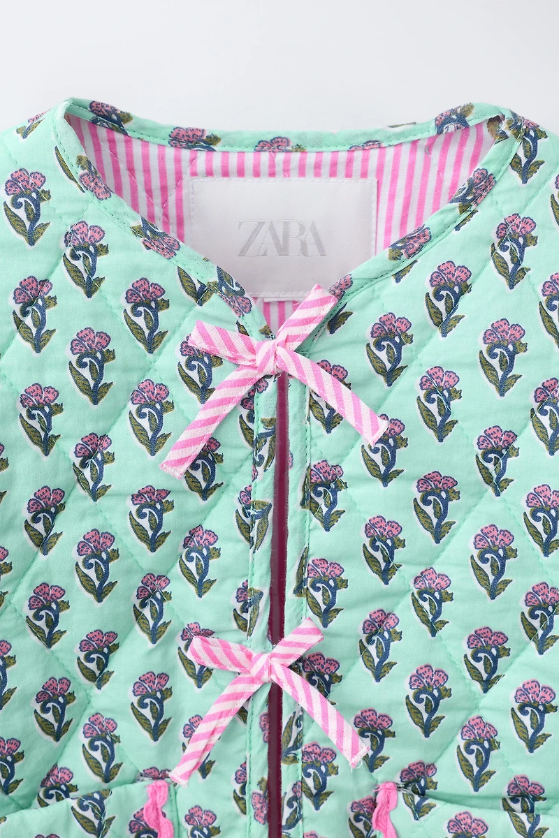 VESTE MATELASSÉE FLEURS ET NŒUDS