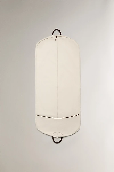 TRAVEL GARMENT BAG WITH LEATHER DETAIL