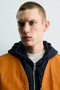 WASHED TOPSTITCHED VEST