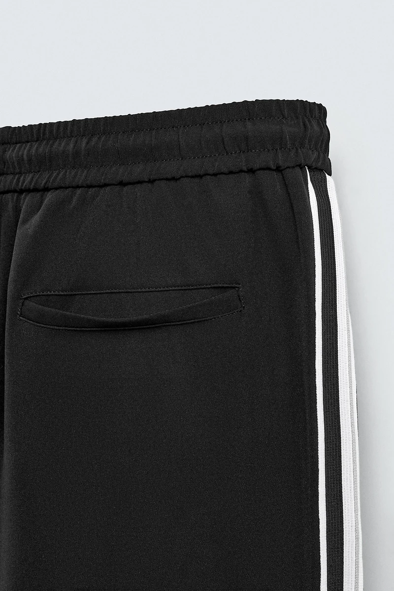 WIDE FIT JOGGER PANTS WITH SIDE STRIPES