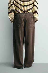 RELAXED FIT HERRINGBONE PANTS
