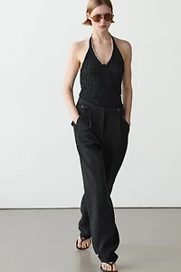 Flowing linen blend trousers with pocket details