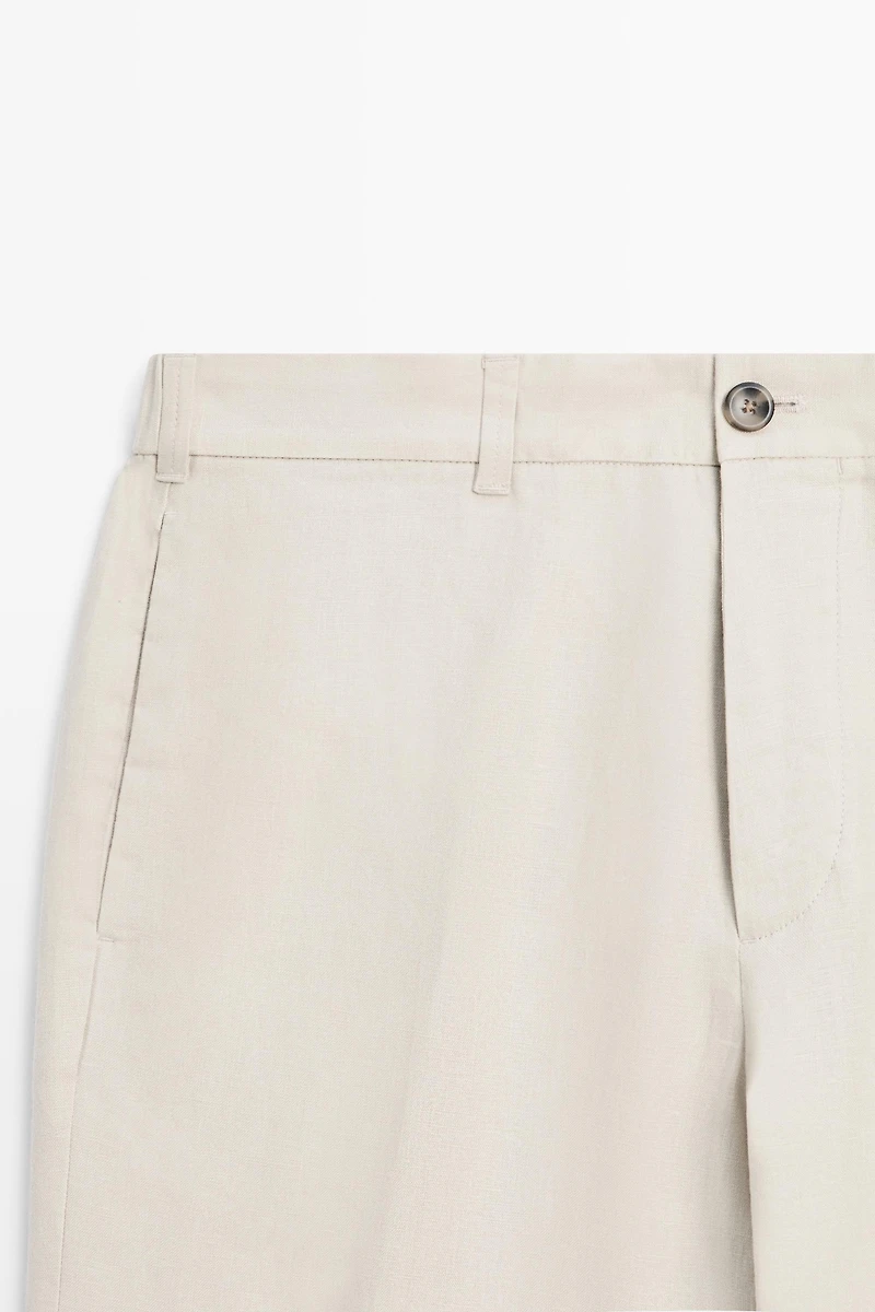 Tapered fit linen trousers