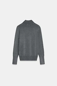 PULL EN MAILLE AVEC BOUTONS