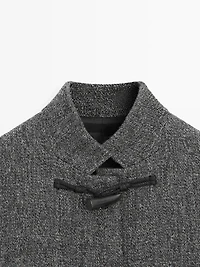 Mid-length coat with horn toggle