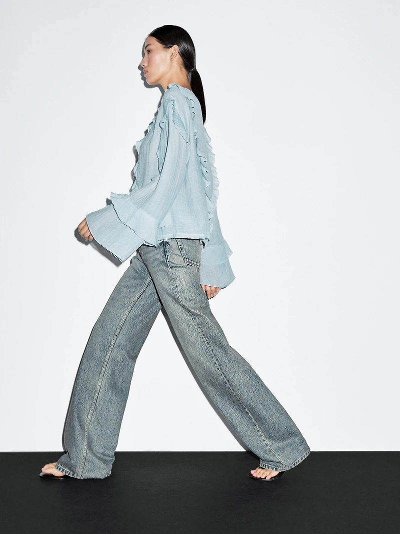 Flowing blouse with ruffles