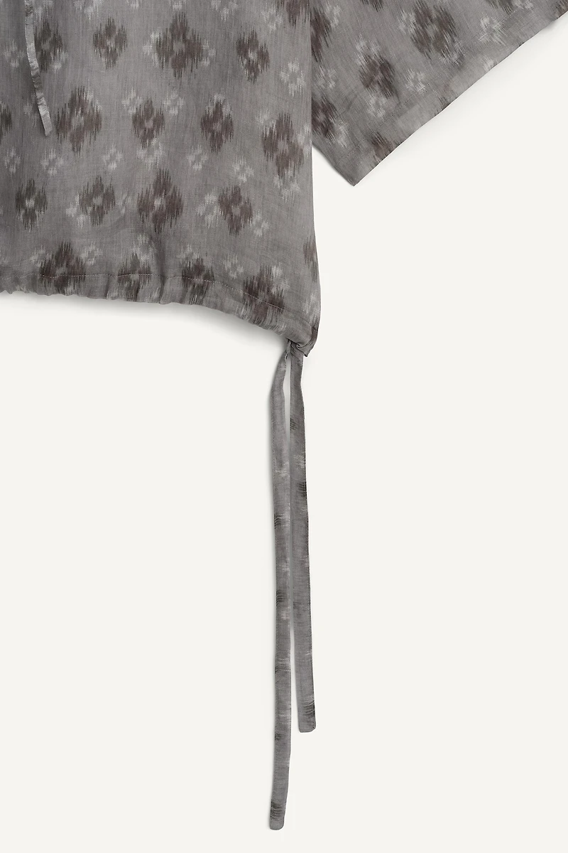 100% RAMIE BOXY FIT POLO SHIRT