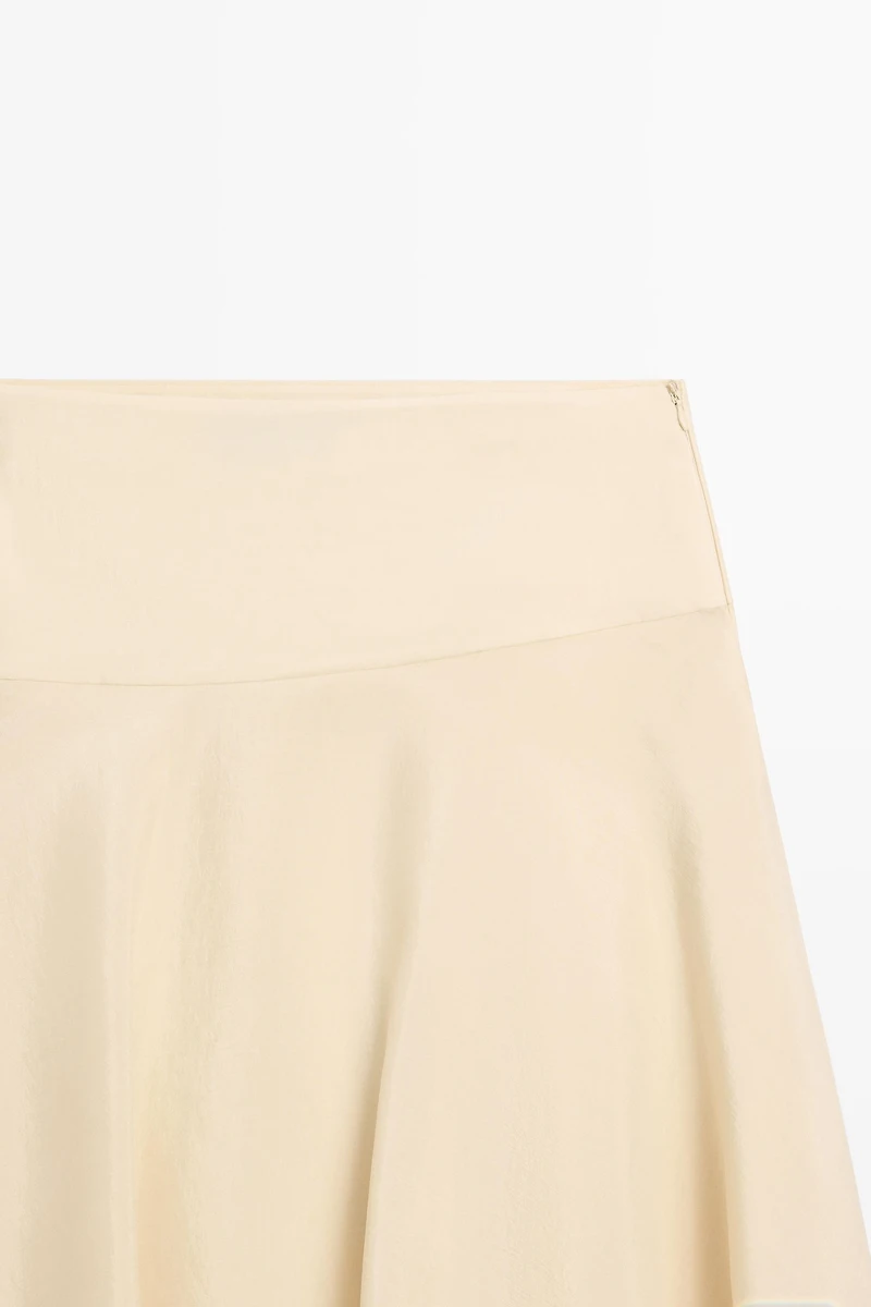 Flowing asymmetric midi skirt