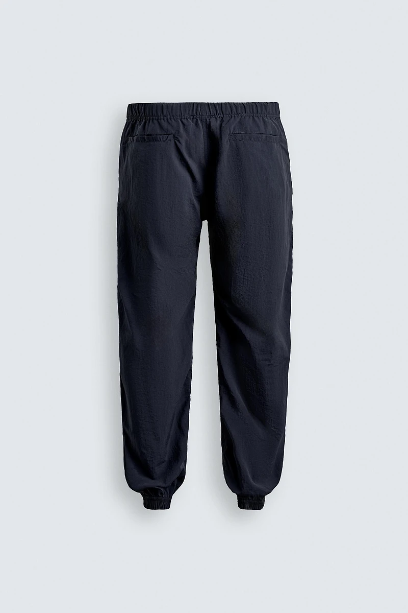 PANTALON TECHNIQUE COUPE DÉCONTRACTÉE