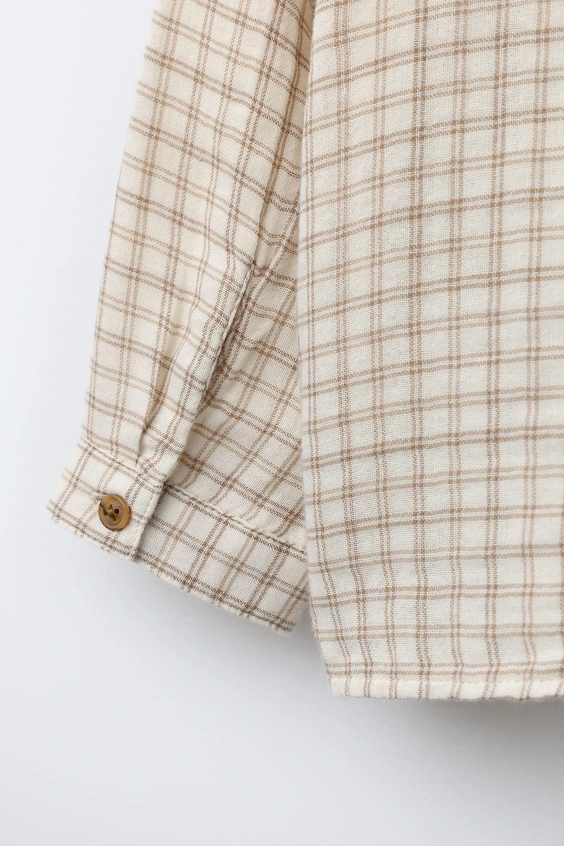 CHEMISE À CARREAUX ET POCHE