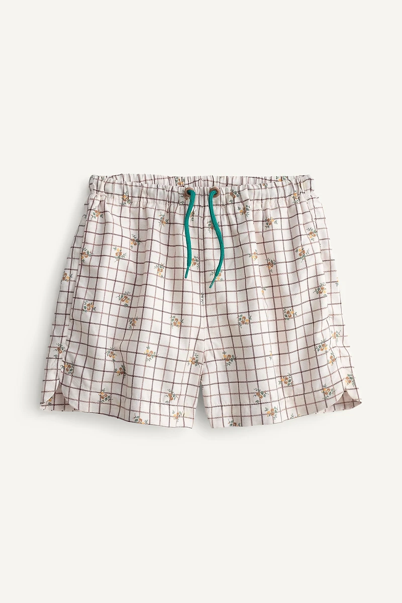 PLAID AND FLORAL LIMITED EDITION SWIM SHORTS