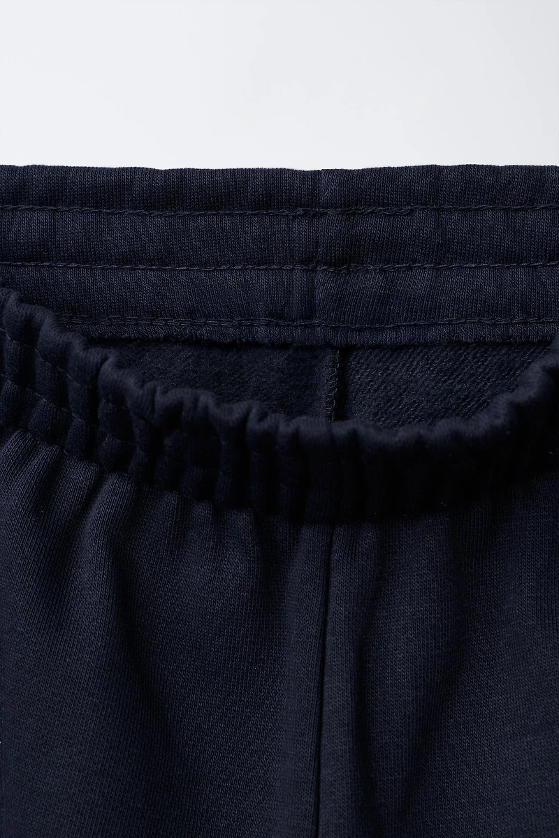 LOT DE DEUX PANTALONS JOGGING EN MOLLETON