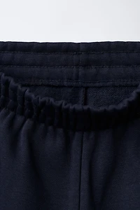LOT DE DEUX PANTALONS JOGGING EN MOLLETON