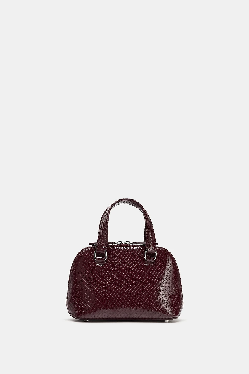 EMBOSSED MINI CITY BAG