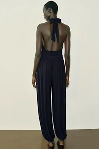 DRAPED HALTER BLOUSE JUMPSUIT