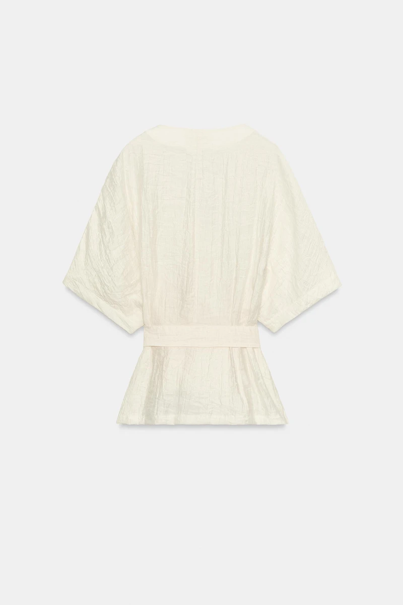 BELTED TOP WITH BUCKLE