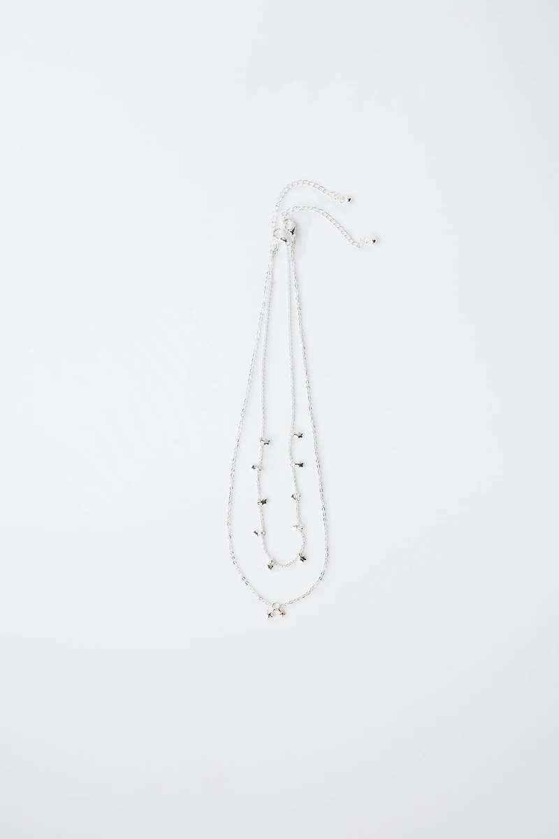 PACK OF TWO STAR NECKLACES