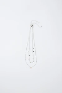 PACK OF TWO STAR NECKLACES