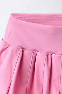PLEATED BIKE SHORT SKIRT