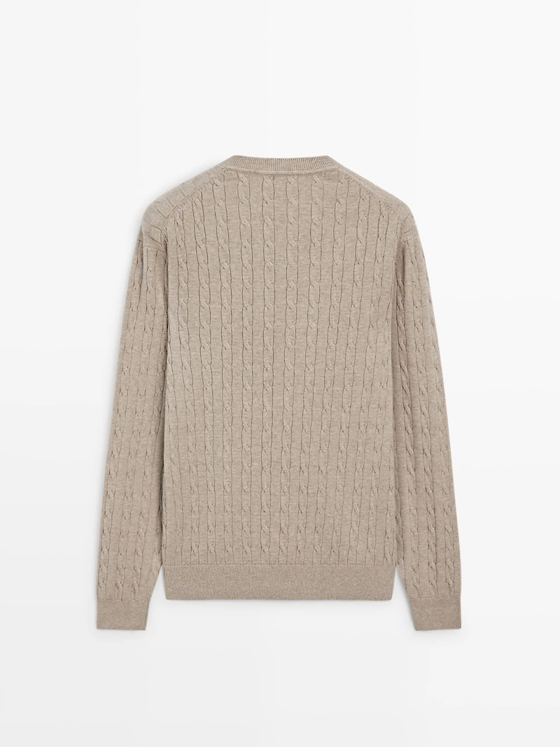 100% cotton cable-knit sweater