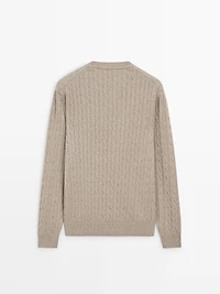 100% cotton cable-knit sweater