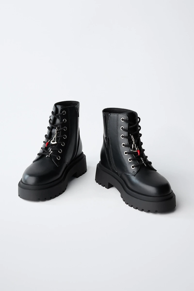 LACED ANKLE BOOTS WITH CHARMS