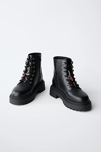 LACED ANKLE BOOTS WITH CHARMS