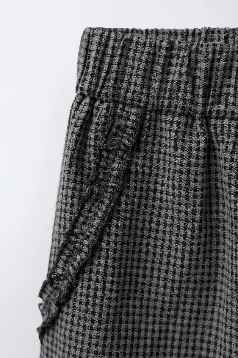 PANTALON À CARREAUX VICHY ET VOLANTS