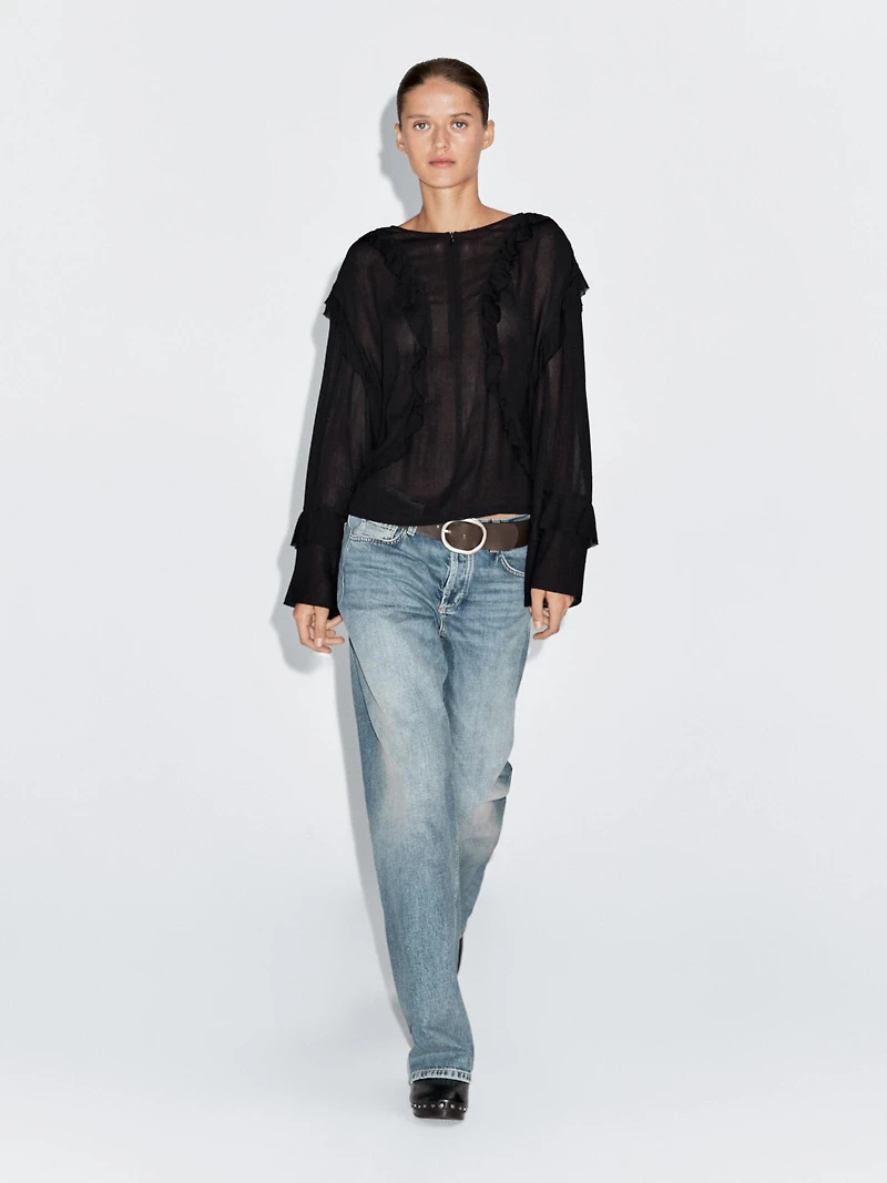 Flowing blouse with ruffles and zip