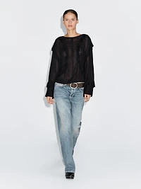 Flowing blouse with ruffles and zip