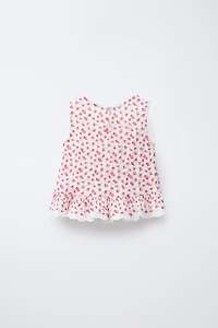 TOP PETITES FLEURS