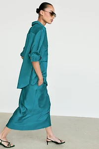 Chemise fluide satinée à poches