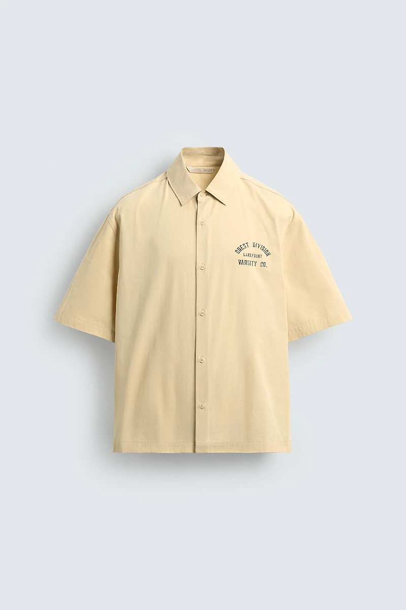PRINTED TEXT BOXY FIT SHIRT