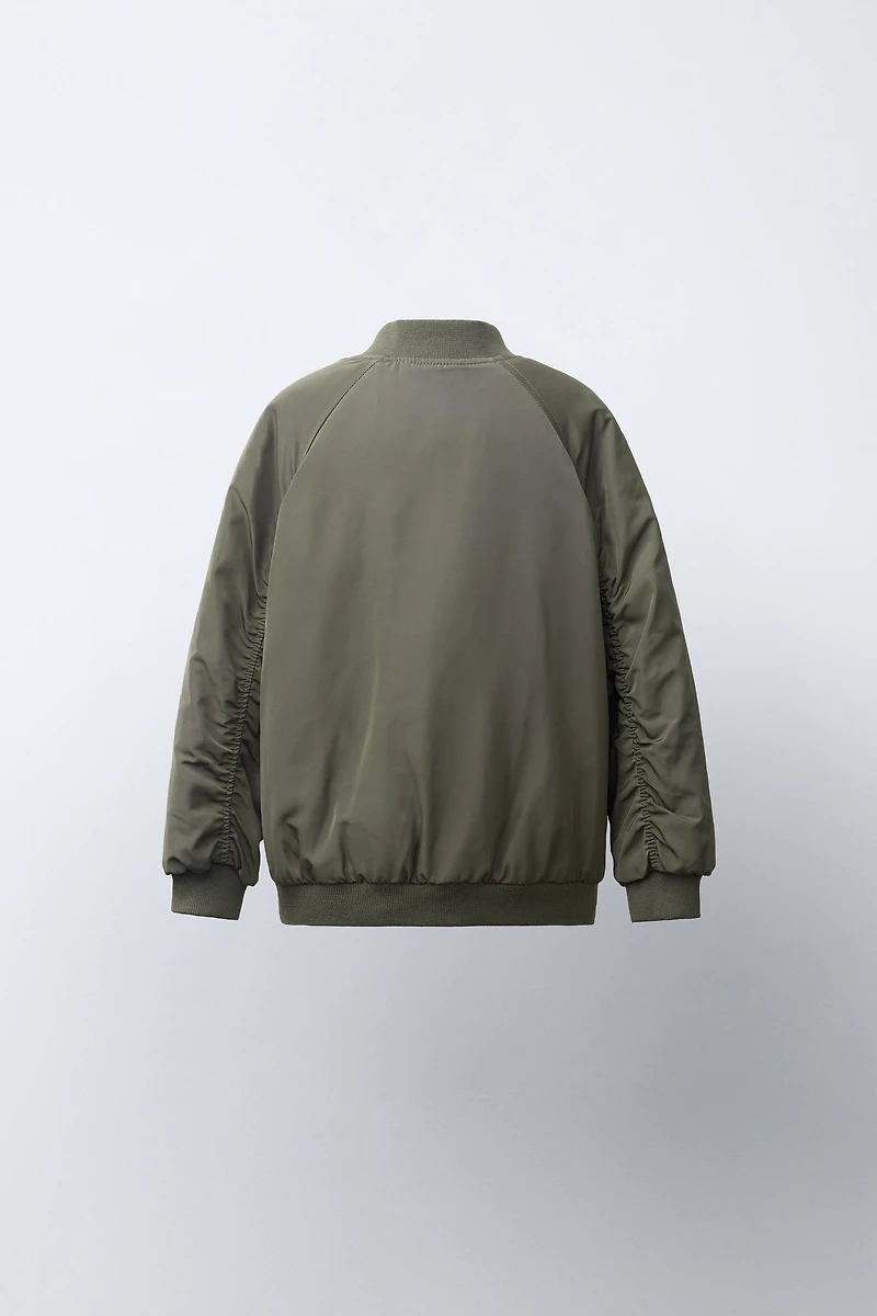 BLOUSON BOMBER À DOUBLURE CONTRASTÉE