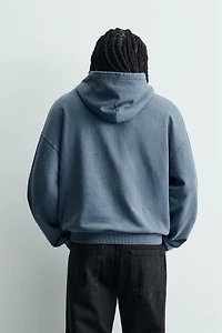 WASHED PRINTED TEXT SWEATSHIRT