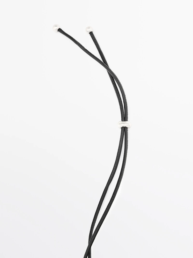 Pendentif pièce abstraite