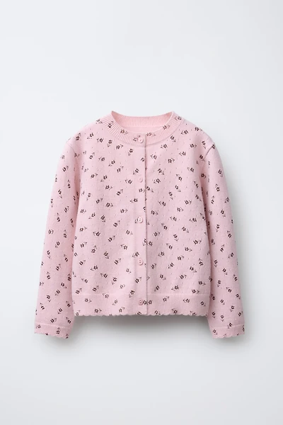 GILET EN MAILLE À FLEURS