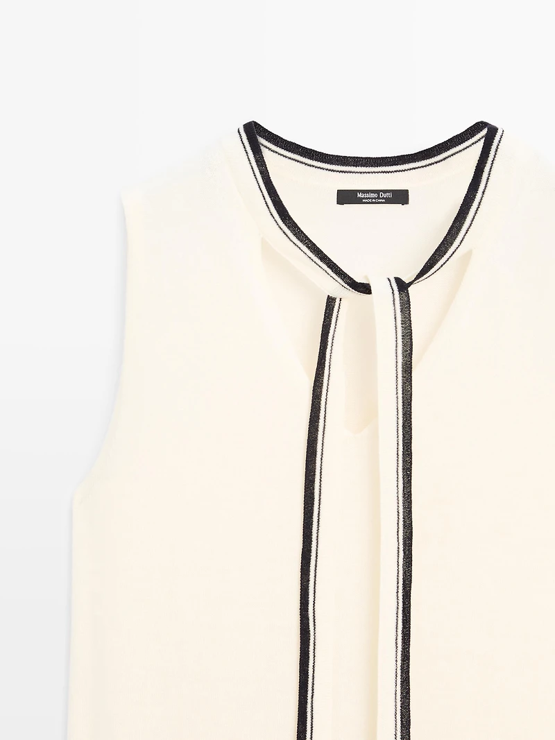 Knit vest with tie detail