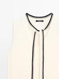 Knit vest with tie detail
