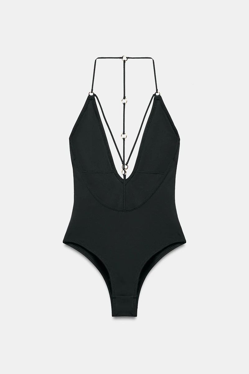 STRAPPY SWIMSUIT WITH EYELETS
