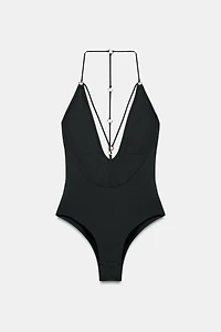 STRAPPY SWIMSUIT WITH EYELETS