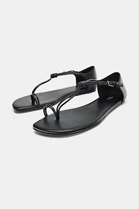 FLAT SANDALS WITH KNOTTED TOE STRAP