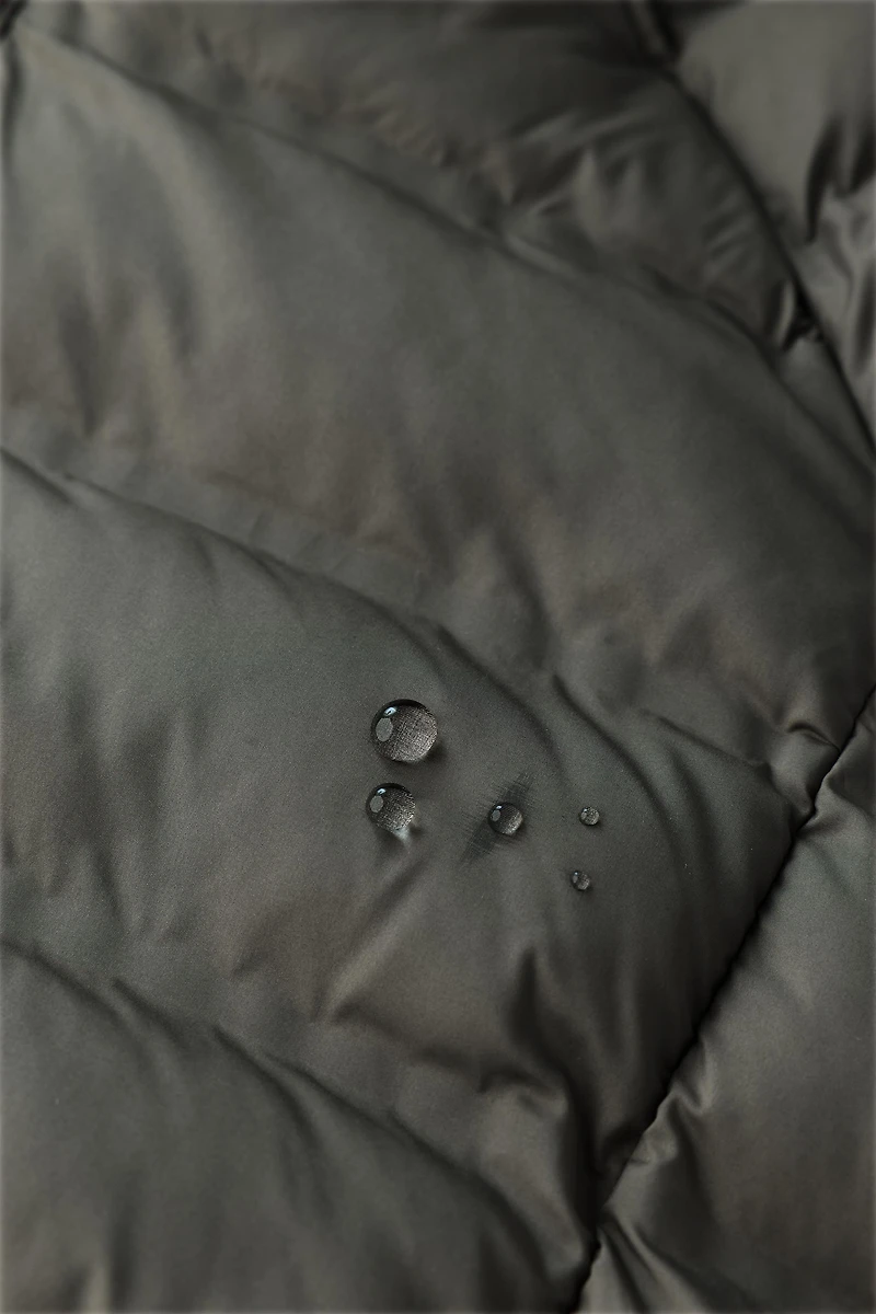 VESTE ULTRALÉGÈRE À CAPUCHE DÉPERLANTE