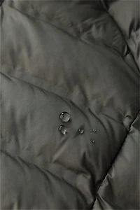 VESTE ULTRALÉGÈRE À CAPUCHE DÉPERLANTE