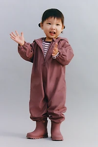 WATER-RESISTANT FLORAL RUBBERIZED JUMPSUIT