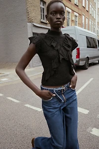 POINTELLE KNIT RUFFLED TOP