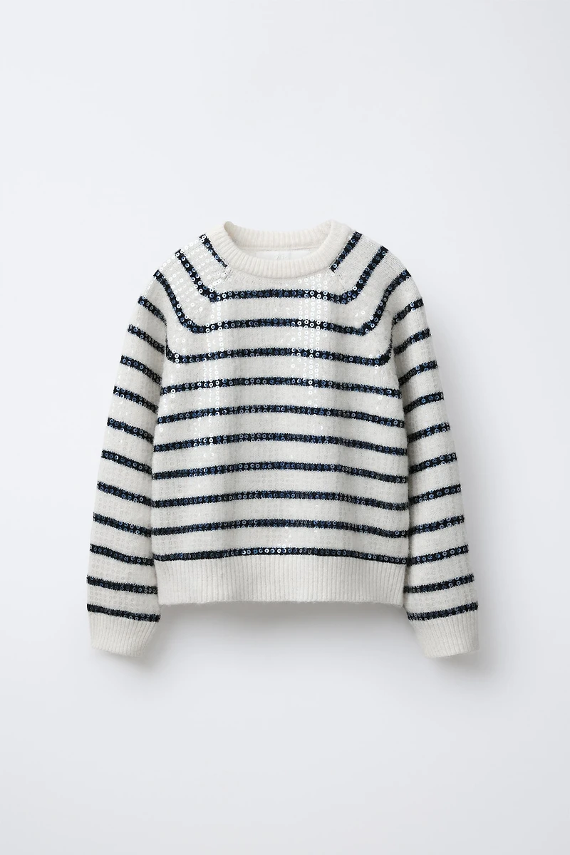 PULL EN MAILLE À RAYURES ET PAILLETTES