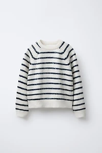 PULL EN MAILLE À RAYURES ET PAILLETTES